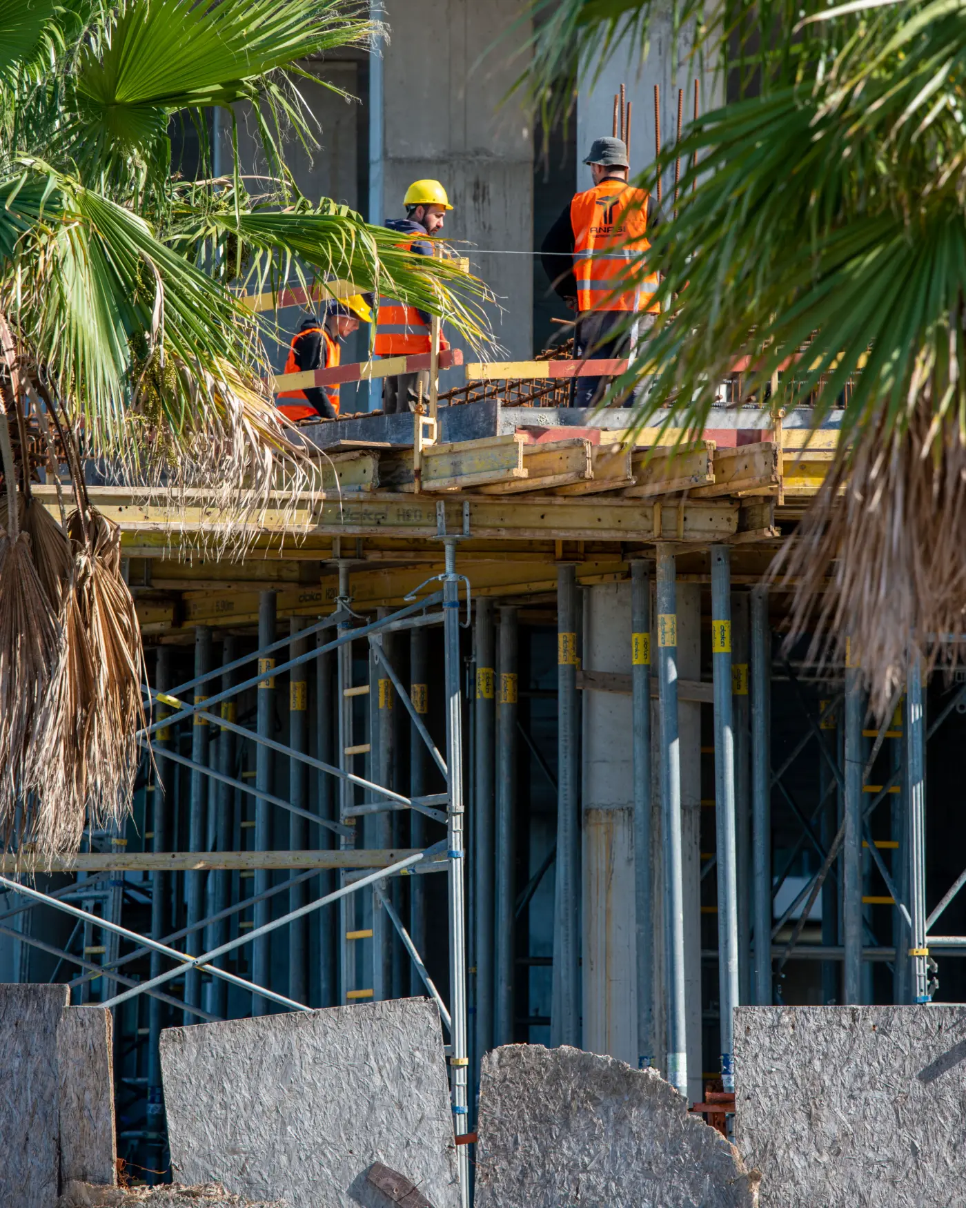 Contractors working on a building under construction